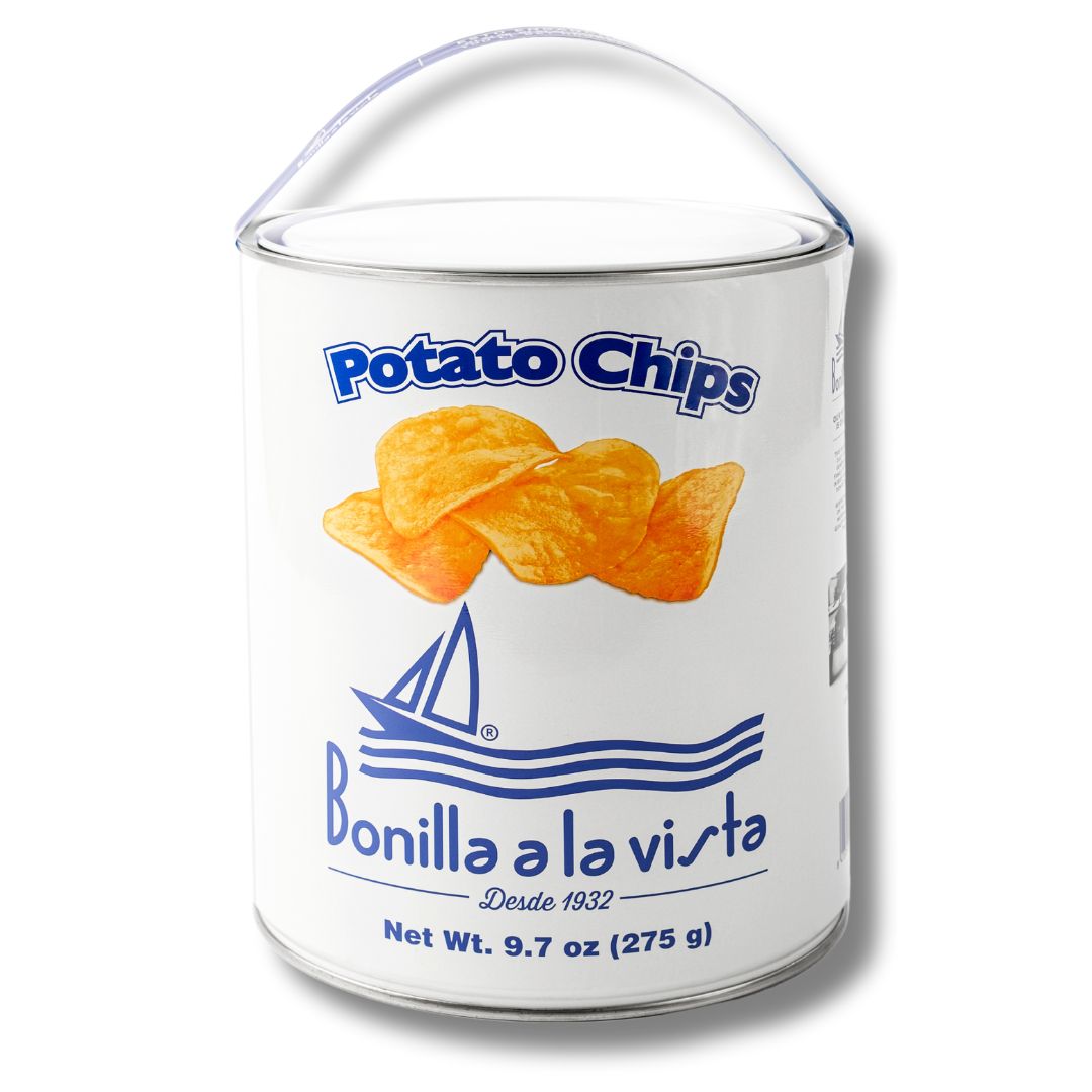 A 275g tin of Bonilla a la Vista potato chips. Featuring a graphic of four potato chips and a sailboat on the open seas. 