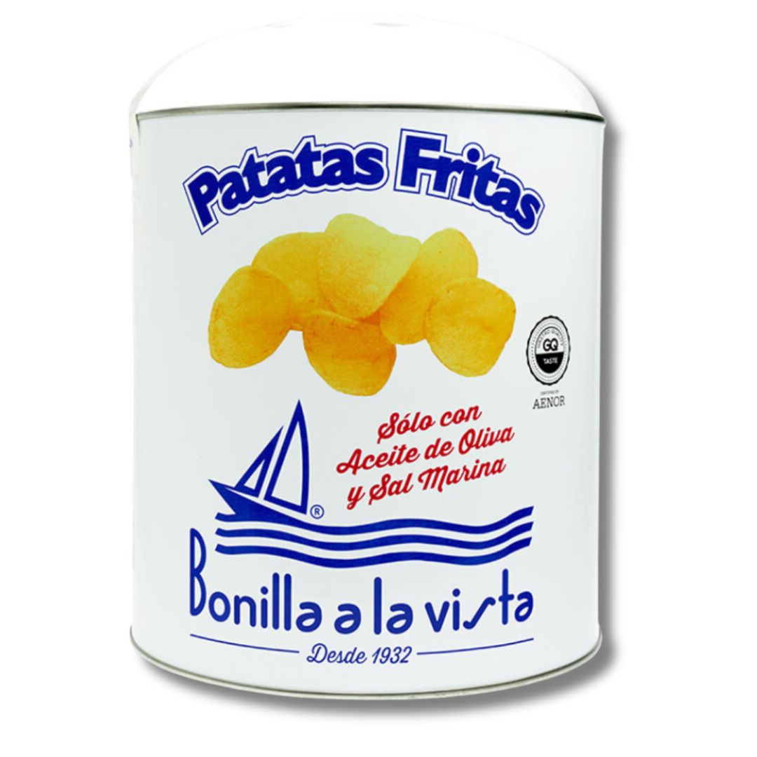 A 500g tin of Bonilla a la Vista Chips. A graphic of chips and a sailboat are presented on the front. 