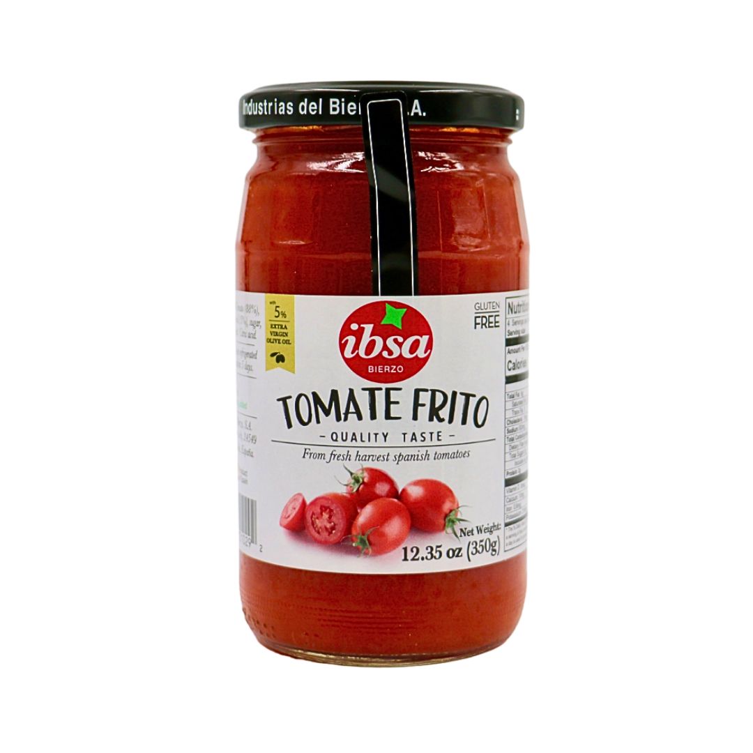 A 12.35 oz jar of IBSA Tomate Frito, made with fresh harvested Spanish tomatoes and 5% extra virgin olive oil. Labeled gluten-free, this rich, slow-cooked tomato sauce offers a traditional Spanish flavor.