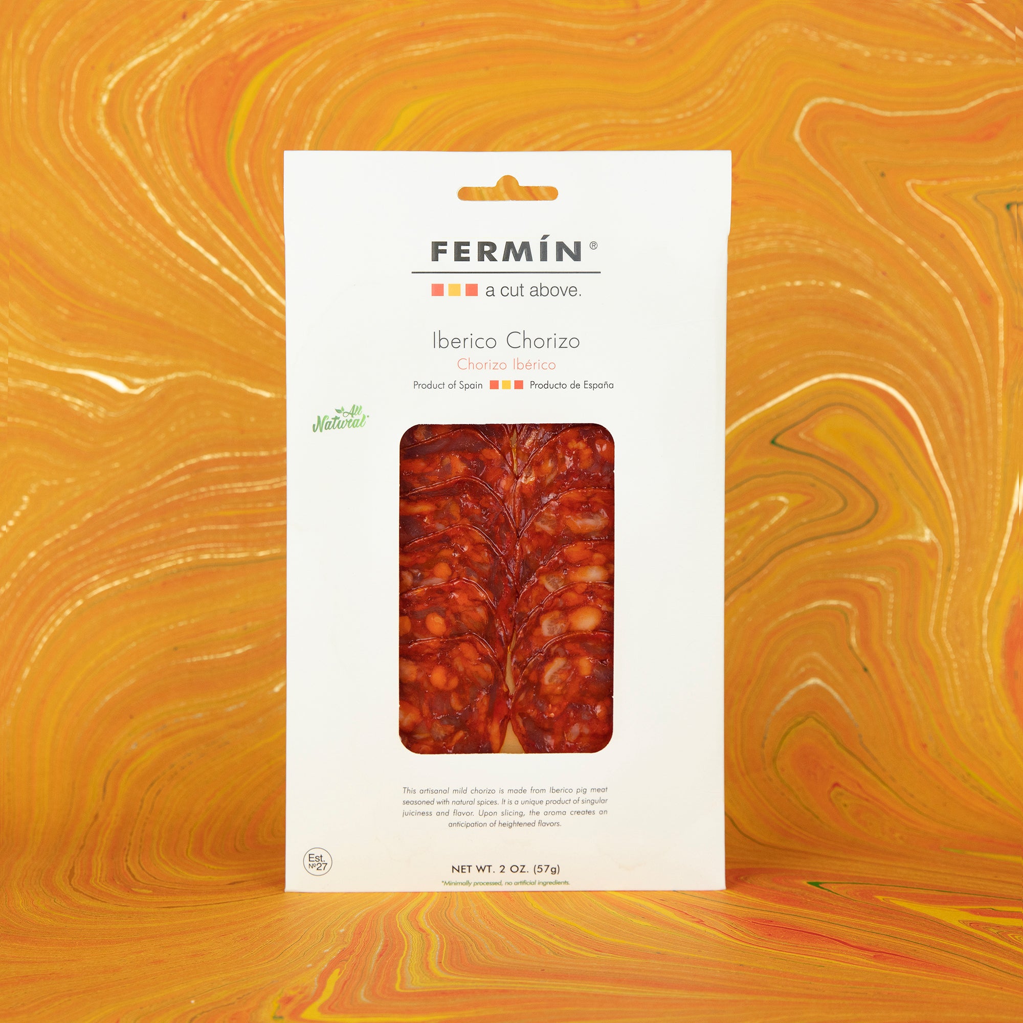 A sleek white package of Fermin Iberico Chorizo showcasing thinly sliced, richly marbled Spanish sausage. Crafted from Iberico pork, this gourmet product highlights traditional Spanish charcuterie and is perfect for tapas, cheese boards, and culinary gift sets.