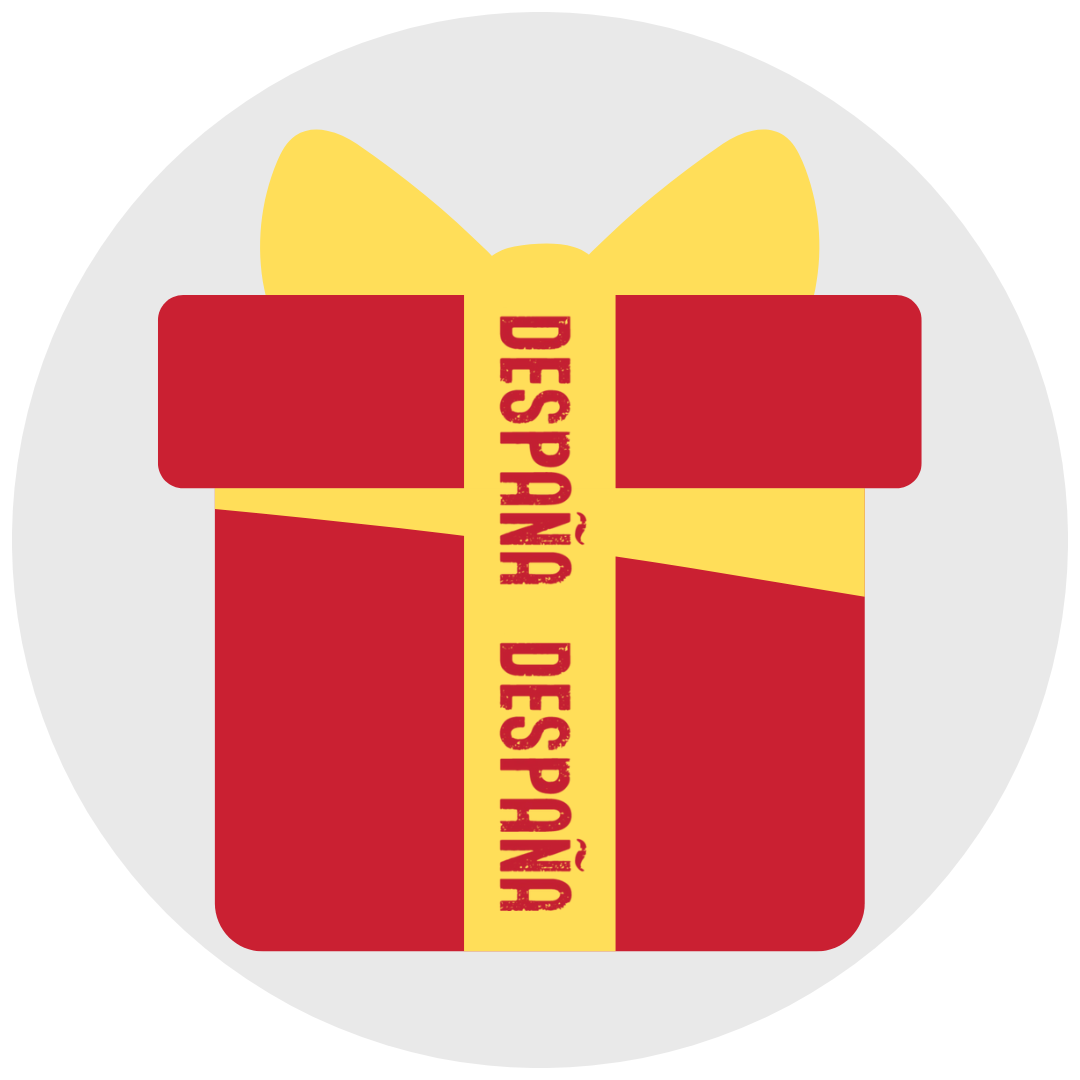 A minimalist illustration of a red gift box with a yellow ribbon and bow. The word “DESPAÑA” repeats vertically down the center, making it a festive icon for Spanish gourmet gifting.