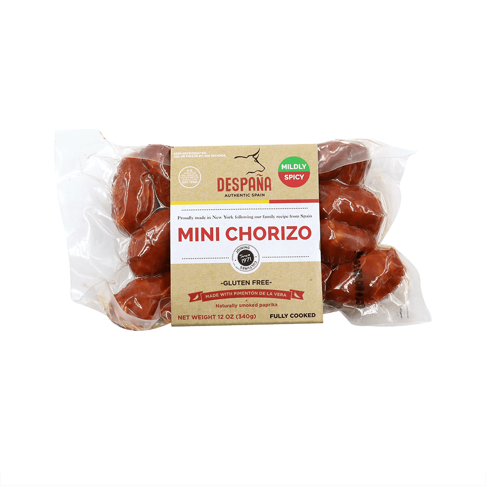 A 12 oz vacuum-sealed pack of Despaña Mini Chorizo, labeled “Mildly Spicy” and “Gluten-Free.” Made with Pimentón de la Vera and naturally smoked paprika. Fully cooked and boldly flavored in bite-sized form.