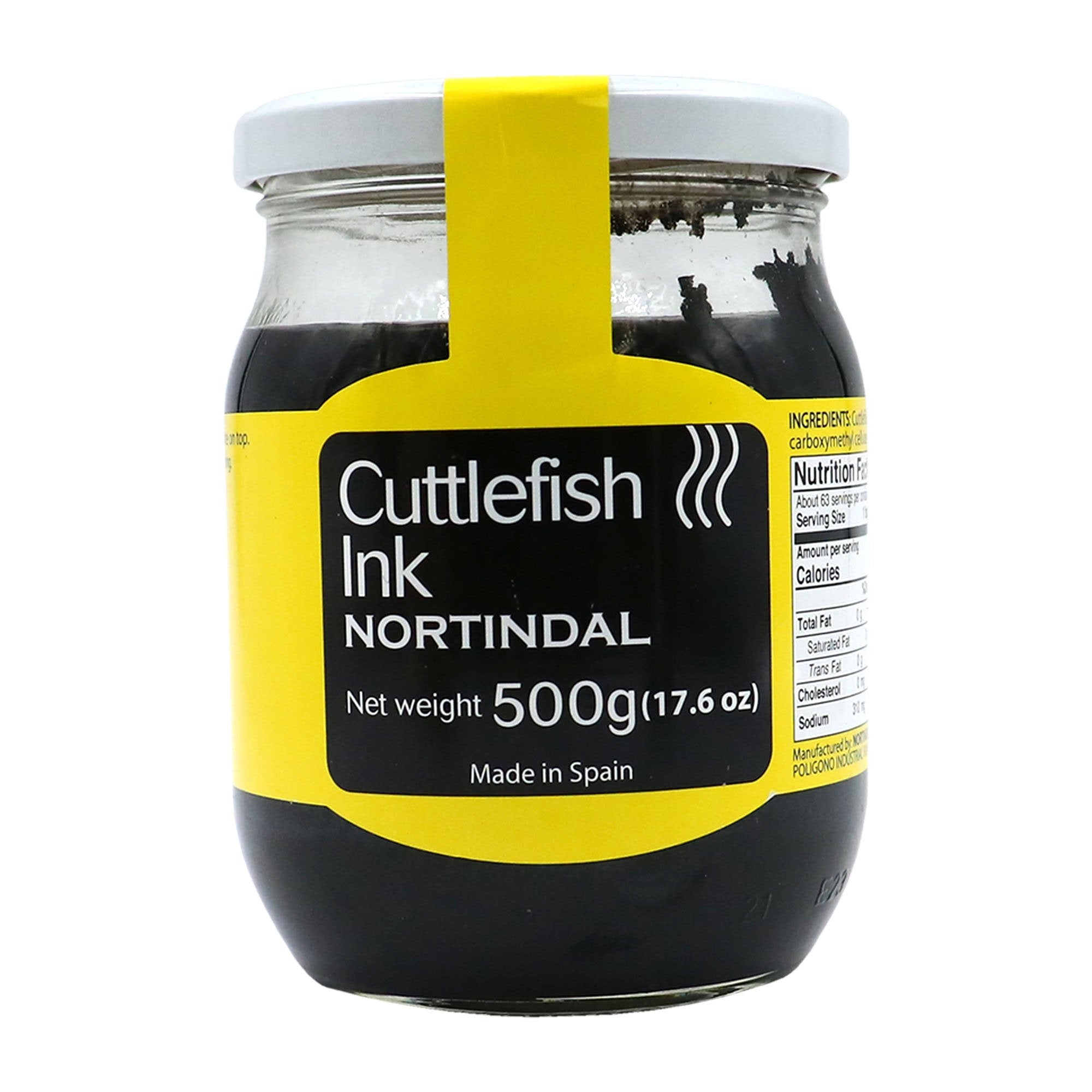 A clear glass jar of Nortindal Cuttlefish Ink with a white lid and a bold yellow label. The front of the label reads "Cuttlefish Ink NORTINDAL" with a net weight of 500g (17.6 oz) and states "Made in Spain." The label includes wavy lines symbolizing steam or aroma. On the side of the jar, nutritional information and ingredients are partially visible. The black cuttlefish ink is clearly visible through the jar.