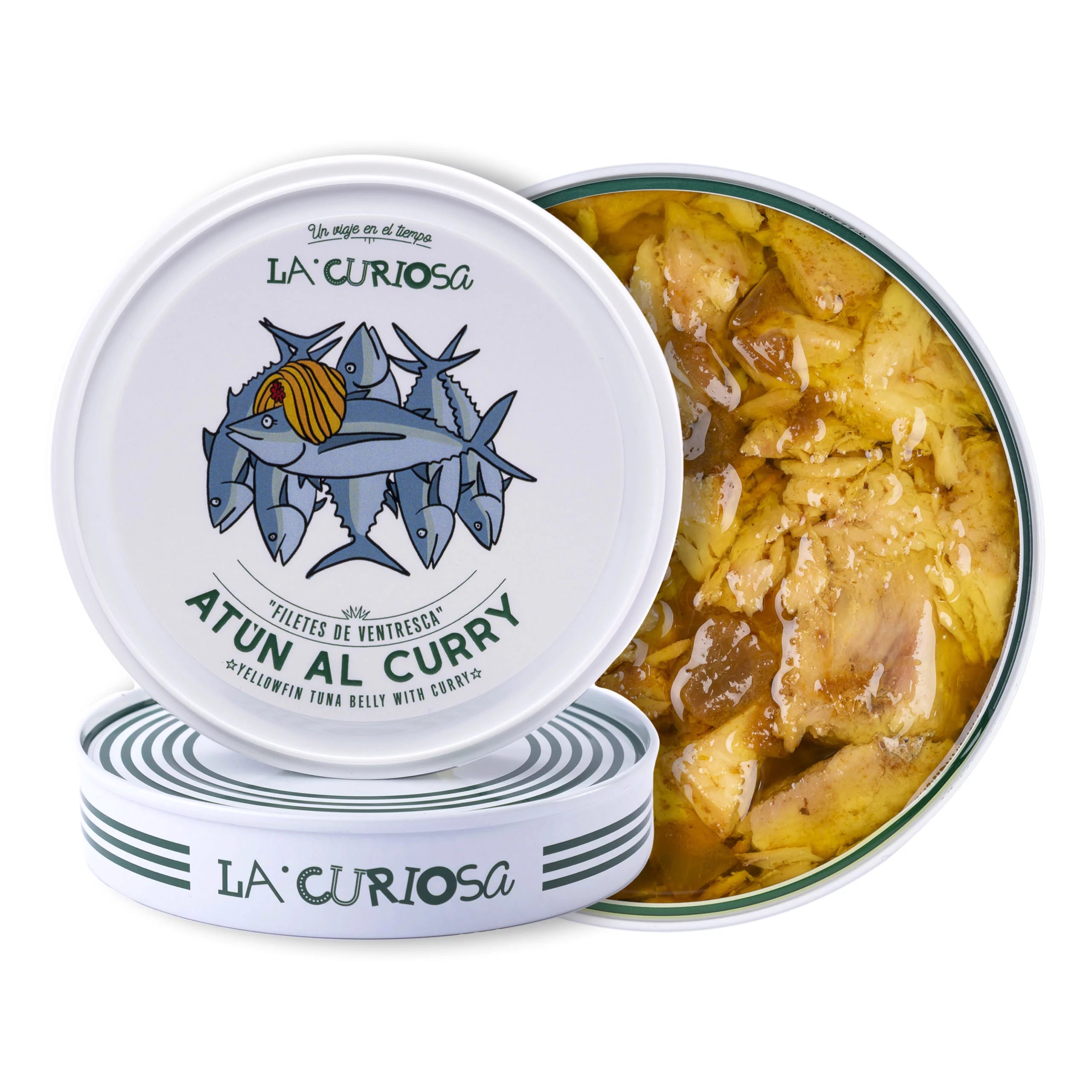 A tin of La Curiosa “Atún al Curry” reveals tender yellowfin tuna belly nestled in a golden curry-infused olive oil. The whimsical lid illustration shows a school of blue tuna crowned with a coconut, hinting at the tropical spice inside. Bright, flaky fillets gleam beneath the surface, ready to impress with bold, aromatic flavor.