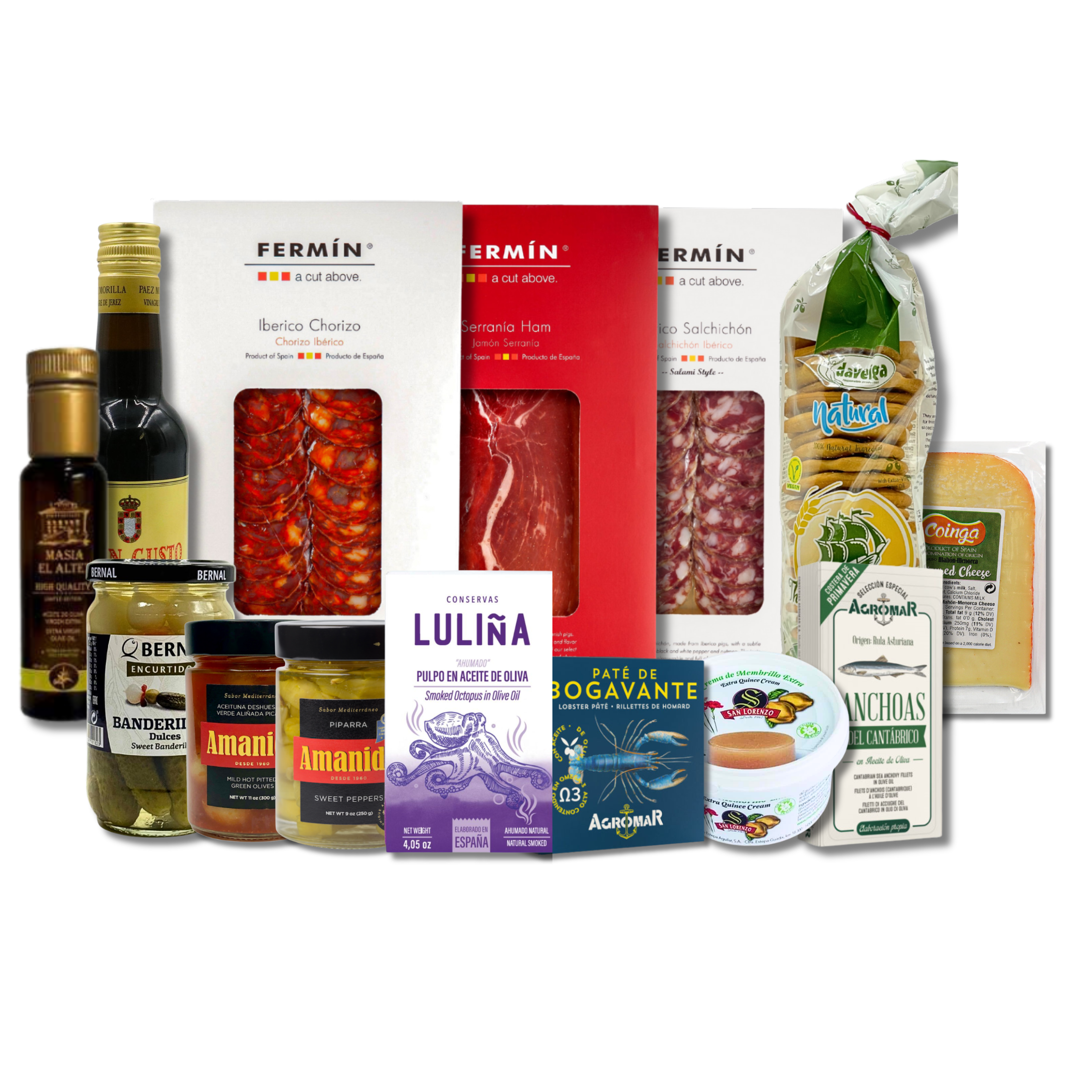 A curated food gift assortment featuring Fermin cured meats, Sancho cheese, Amani jam, Lulira chocolate, and other Spanish delicacies arranged together on a plain white background.