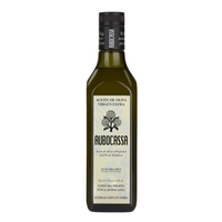 A bottle of Aubocassa Extra Virgin Olive Oil, crafted from arbequina olives in Mallorca. Elegant label design with detailed D.O. (Denomination of Origin) credentials and cold-extraction technique highlighted.