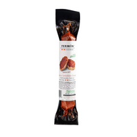 Encased in sleek vacuum-sealed packaging, FERMÍN's Ibérico Spreadable Chorizo stands out with its deep red hue and rustic label. A photo of toasts topped with the spicy, savory spread hints at its rich, smoky flavor—crafted in Spain, all-natural, and ready to elevate any bite.